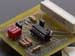 The Arduino Telegraph Shield is a custom made shield for the popular Arduino circuit board.  It allows the arduino to drive the coils of a telegraph when motion is relayed from a pezio sensor.